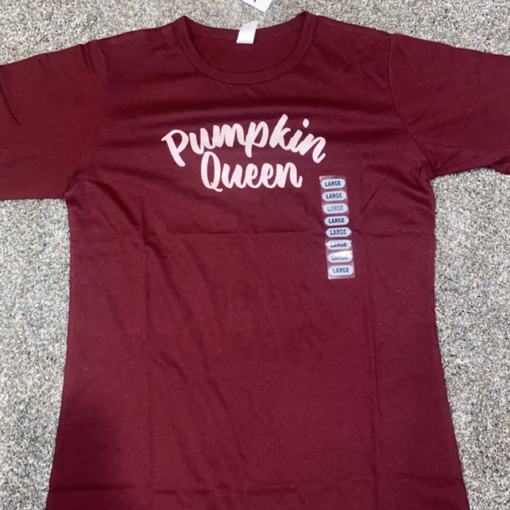Maroon pumpkin queen tee with pink writing size L